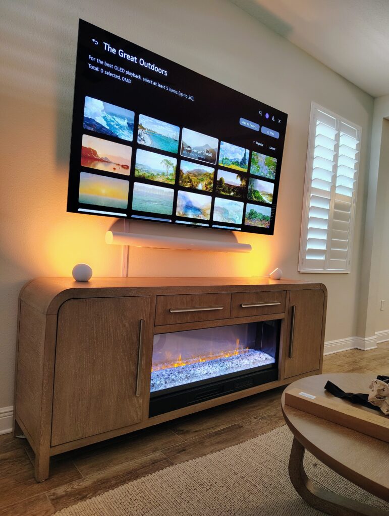 75" TV Mounted with soundbar in Tampa, FL